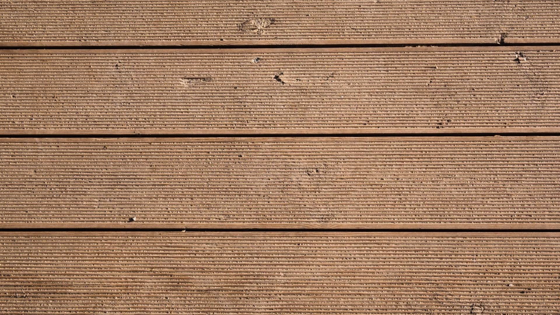 Closeup photo of brown wood siding